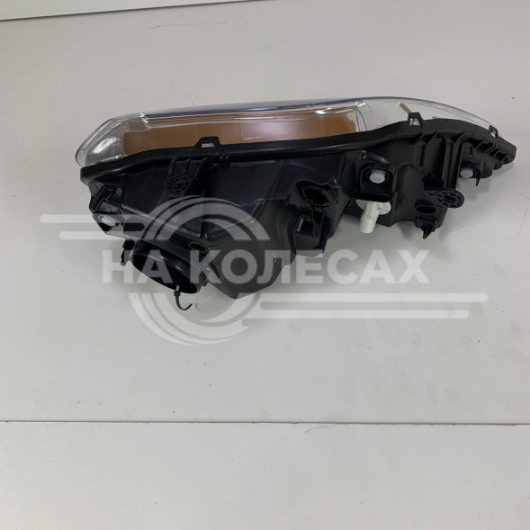Фара левая RENAULT LOGAN 2010- ELECTRIC W/O MOTOR