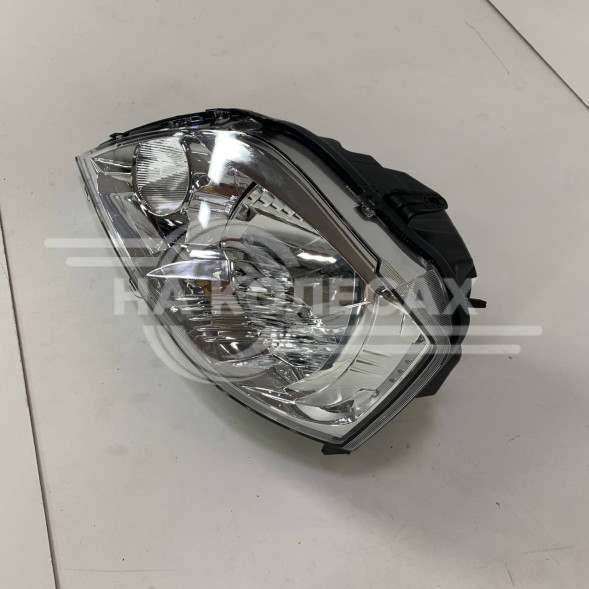 Фара левая RENAULT LOGAN 2010- ELECTRIC W/O MOTOR