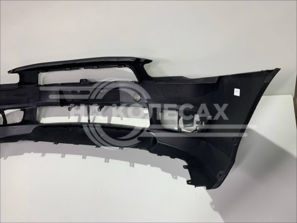 Бампер передний Mitsubishi Lancer 07-10 (Под ПТФ/ С отверстием под крюк)