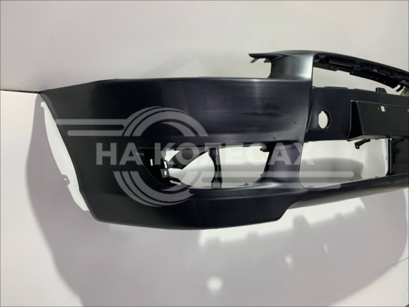 Бампер передний Mitsubishi Lancer 07-10 (Под ПТФ/ С отверстием под крюк)