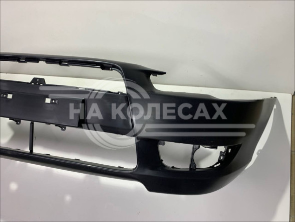 Бампер передний Mitsubishi Lancer 07-10 (Под ПТФ/ С отверстием под крюк)
