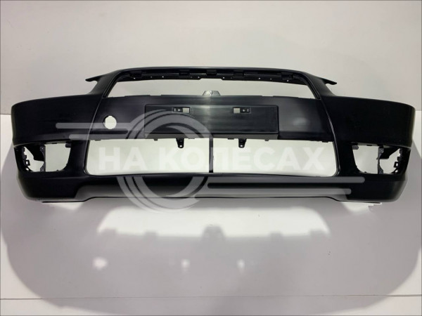 Бампер передний Mitsubishi Lancer 07-10 (Под ПТФ/ С отверстием под крюк)