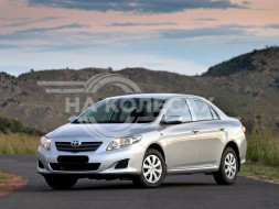 Бампер передний TOYOTA COROLLA 06-10 под омыватели