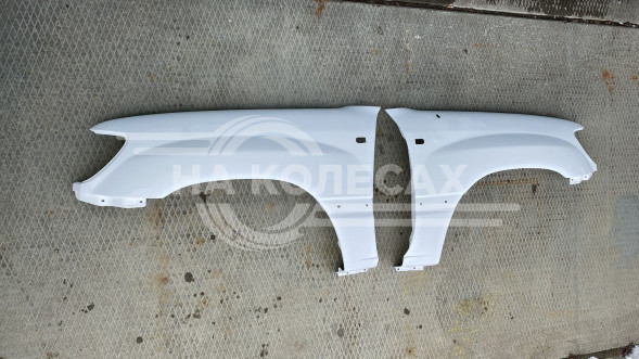 Стеклопластиковые крылья Toyota Land Cruiser (J100)