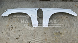Стеклопластиковые крылья Toyota Land Cruiser (J100)