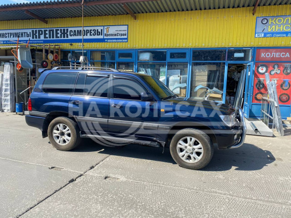 Стеклопластиковые крылья Toyota Land Cruiser (J100)