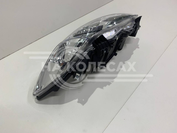 Фара передняя Toyota Corolla E150 06-10