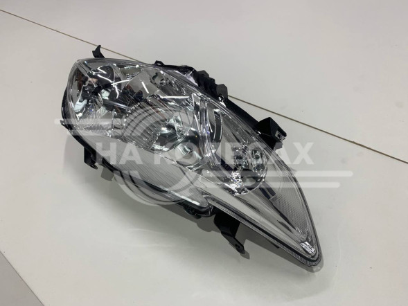 Фара передняя Toyota Corolla E150 06-10